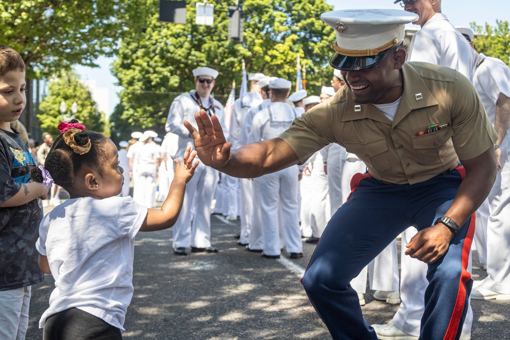 Marines and Sailors Participate in the Grand Floral Parade during Portland Fleet Week