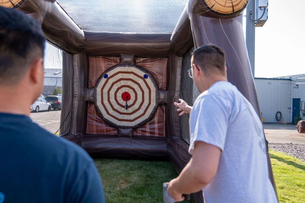 Hitting the Mark: Airmen throw Velcro axes during the 2025 Unite Event at the Nevada Air National Guard Base