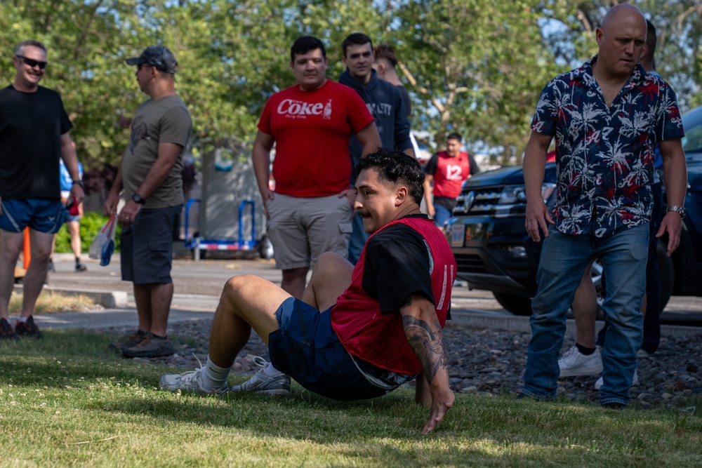 CRAB CRAWL: Airmen compete in a relay race during the UNITE Event at Nevada Air National Guard Base