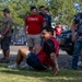 CRAB CRAWL: Airmen compete in a relay race during the UNITE Event at Nevada Air National Guard Base