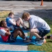 Airmen compete in a relay race during the UNITE Event at Nevada Air National Guard Base