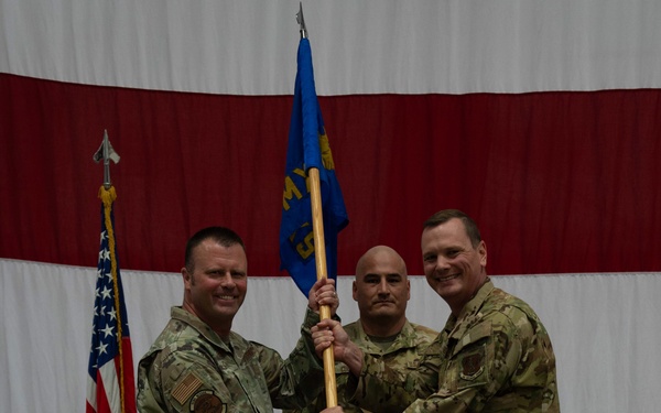 Lt. Col. Reed Kobernik relinquishes responsibility of the 152nd Maintenance Squadron during a change of command ceremony at Nevada Air National Guard Base