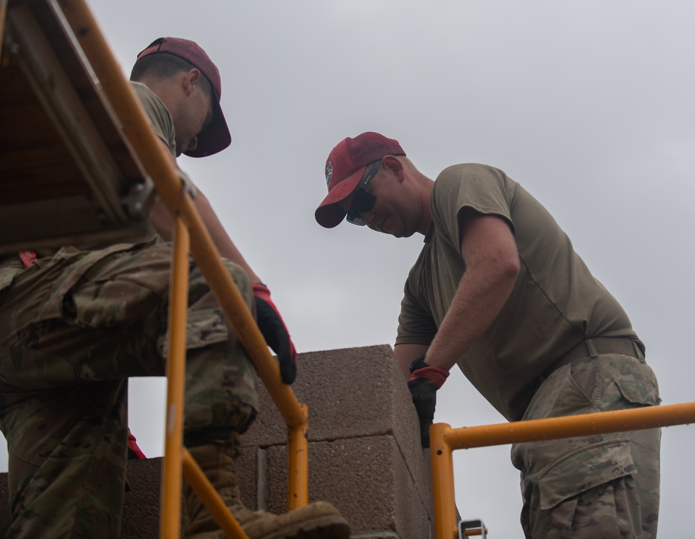 Airmen construct tower for Army weapons range