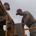 Airmen construct tower for Army weapons range