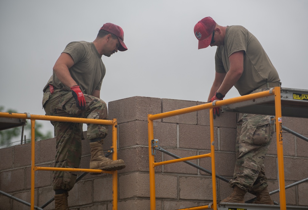 Airmen construct tower for Army weapons range