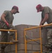 Airmen construct tower for Army weapons range