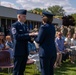 Retired Chief Master Sgt. Linton presented with American flag at retreat ceremony