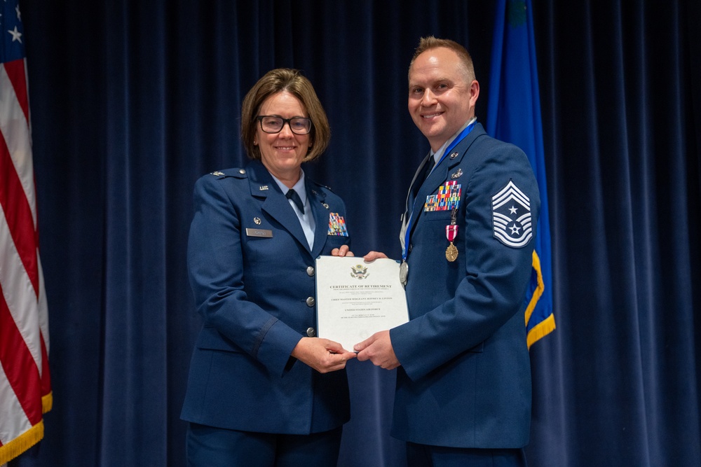 Command Chief Master Sgt. Receives Retirement Certificate.