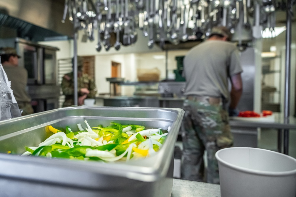 913th Quartermasters Prepare Food for Drilling Soldiers