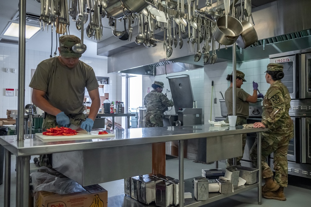 913th Quartermasters Prepare Food for Drilling Soldiers