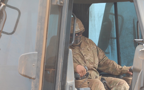 877th QM CO Operator Recognized for Outstanding Dozer Work