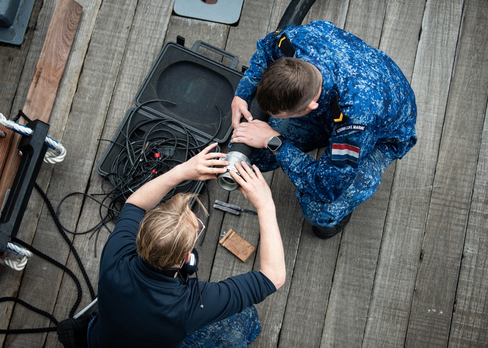 Estonian minehunter Sakala receives a refueling at sea during BALTOPS 25
