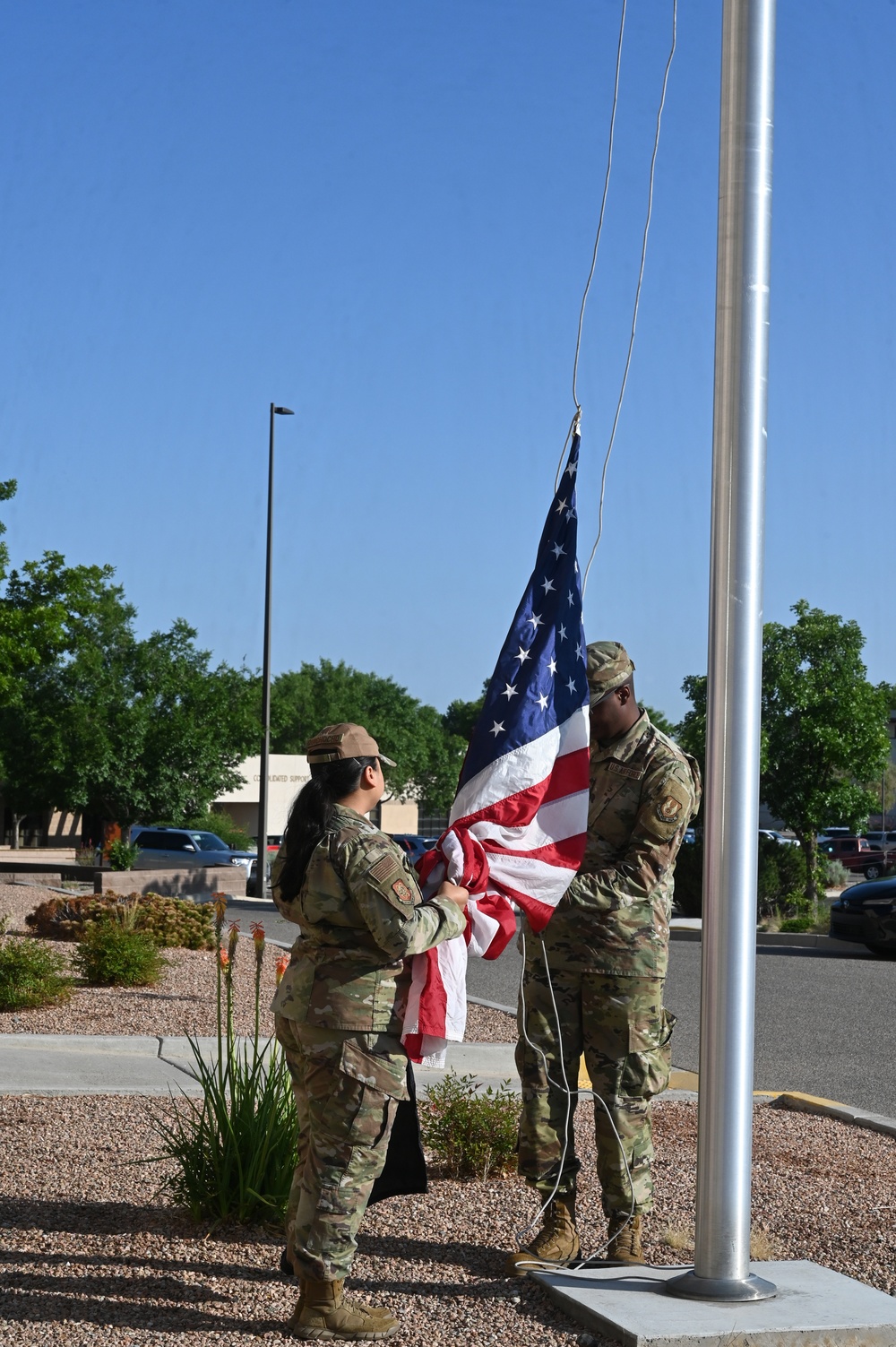 Airmen raise U.S. flag