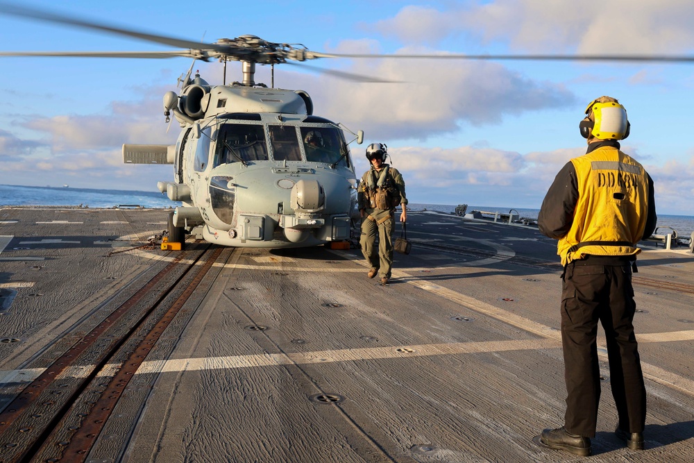 Lt. Cmdr. Michael Washington receives the safe to transit signal from BM1 Jason Carpenter