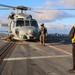 Lt. Cmdr. Michael Washington receives the safe to transit signal from BM1 Jason Carpenter