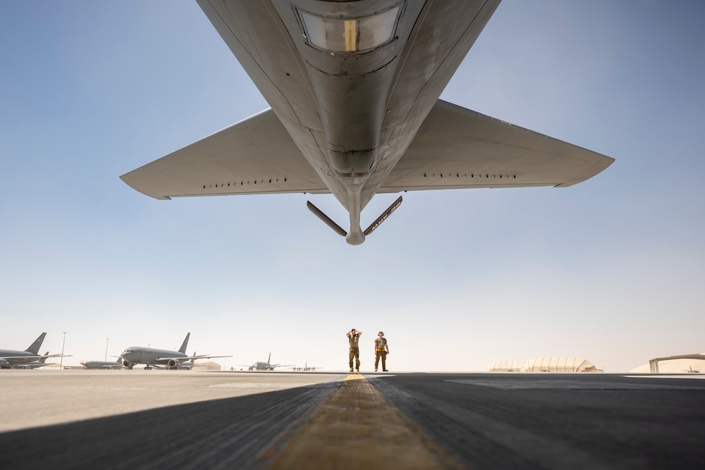 Air Force Thunderbolt II's and Strike Eagles refuel over USCENTCOM AOR