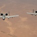 Air Force Thunderbolt II's and Strike Eagles refuel over USCENTCOM AOR