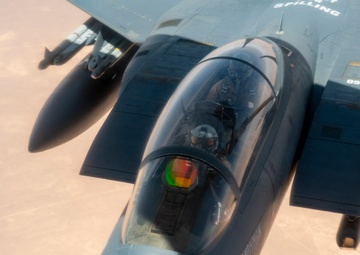 Air Force Thunderbolt II's and Strike Eagles refuel over USCENTCOM AOR