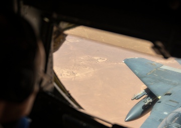 Air Force Thunderbolt II's and Strike Eagles refuel over USCENTCOM AOR