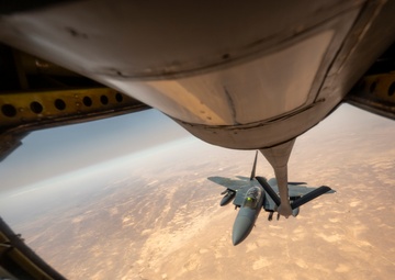Air Force Thunderbolt II's and Strike Eagles refuel over USCENTCOM AOR