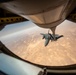 Air Force Thunderbolt II's and Strike Eagles refuel over USCENTCOM AOR