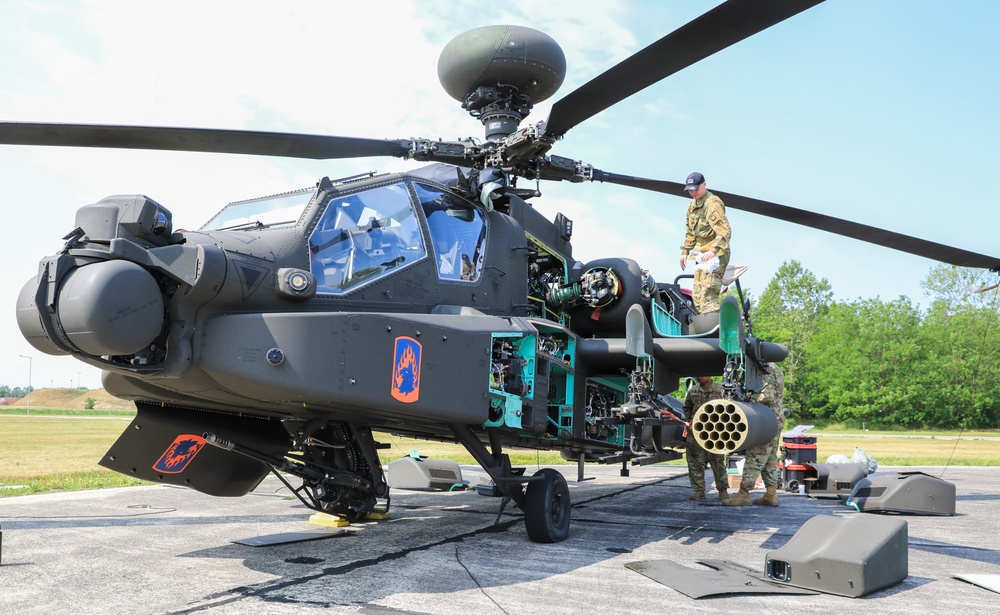 12th CAB conduct preventative maintenance checks and services on AH-64 Apache Attack Helicopter during Saber Guardian 25