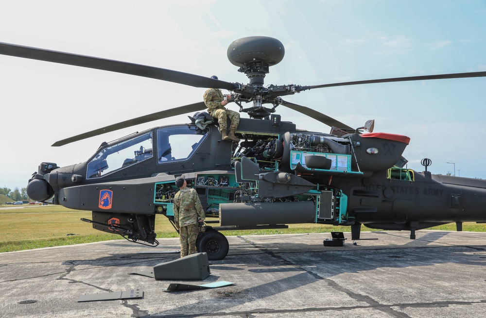 12th CAB conduct preventative maintenance checks and services on AH-64 Apache Attack Helicopter during Saber Guardian 25