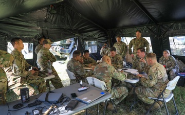 12th CAB Soldiers hold a planning meeting to maintain their operational readiness during Saber Guardian 25