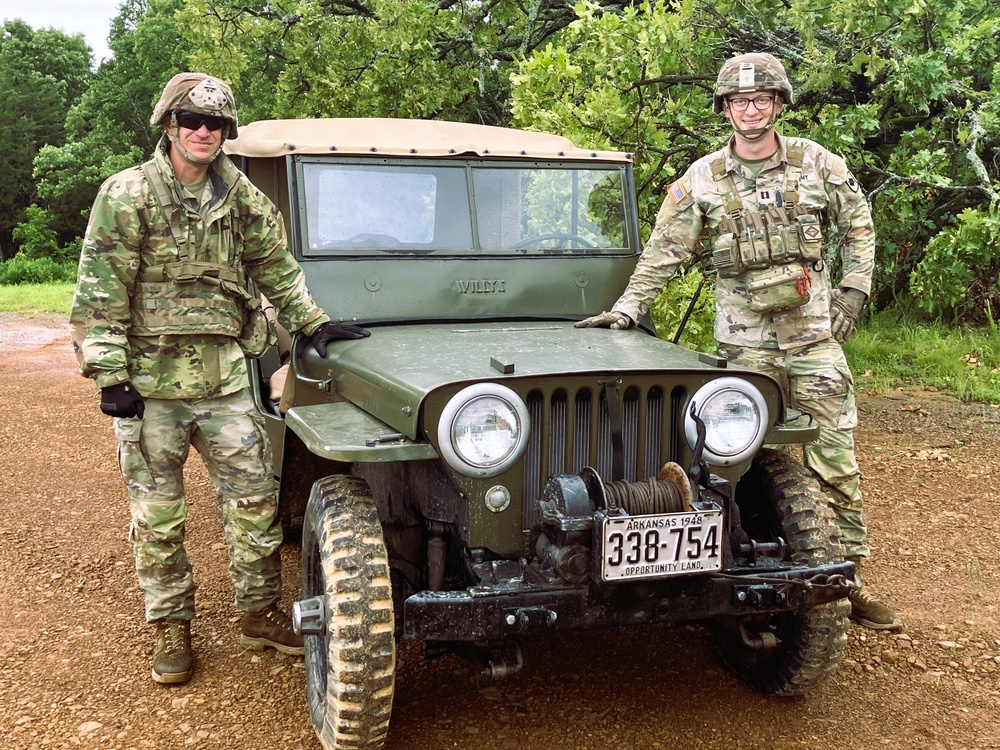 Capt. Comb Drives 1948 Jeep to Boost Morale During Annual Training