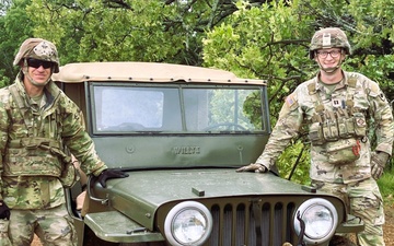 Capt. Comb Drives 1948 Jeep to Boost Morale During Annual Training