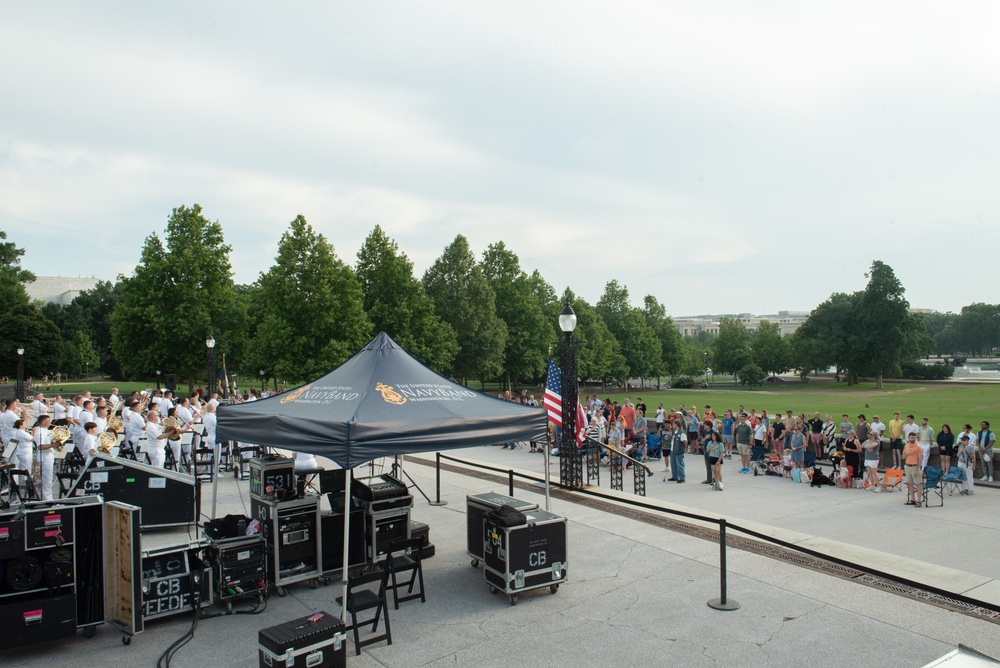 The United States Navy Band performs on the western steps of the United States Capitol Building.