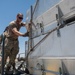 332 ELRS “Port Dawgs” unload equipment from a C-17