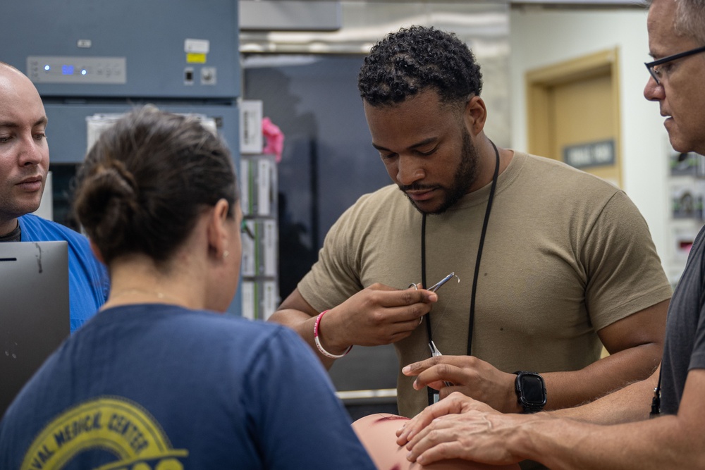 Service Members Conduct Medical Training