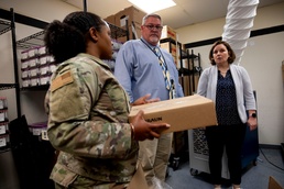 Operational Medical Systems Team inspects a shipment of Freeze-Dried Plasma