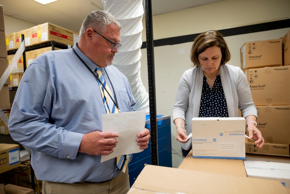 Operational Medical Systems Team inspects a shipment of Freeze-Dried Plasma