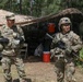 Iowa National Guard Soldier receives coin from Brig. Gen. Adams