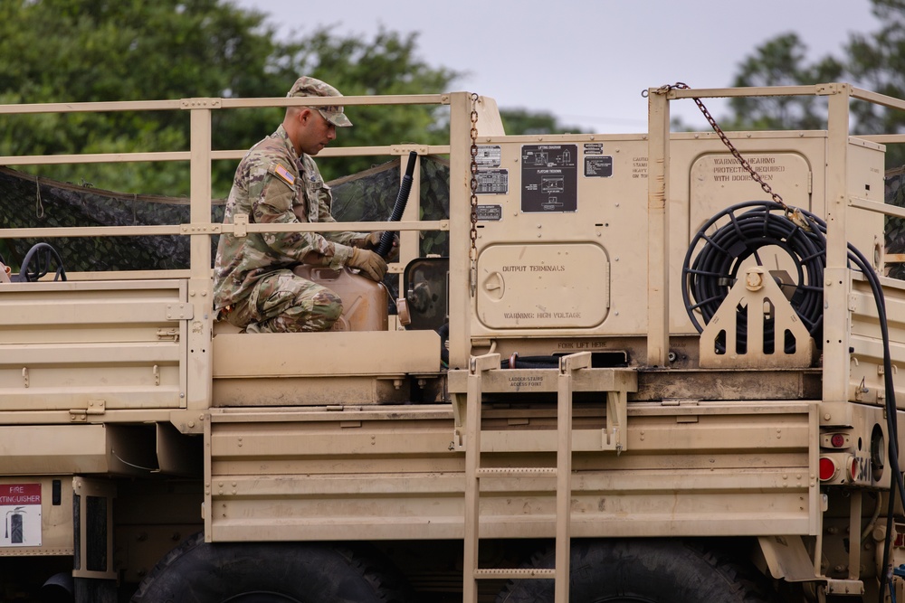 Soldiers maintain equipment at Pike Field