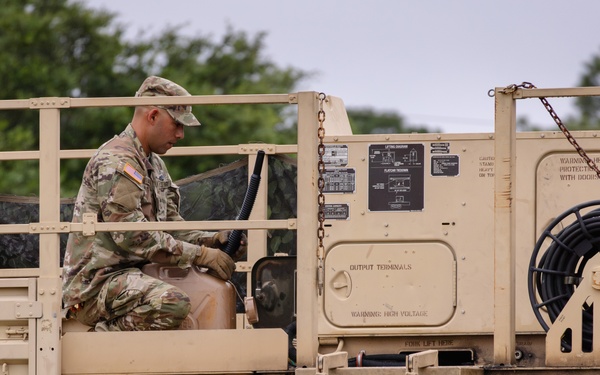 Soldiers maintain equipment at Pike Field