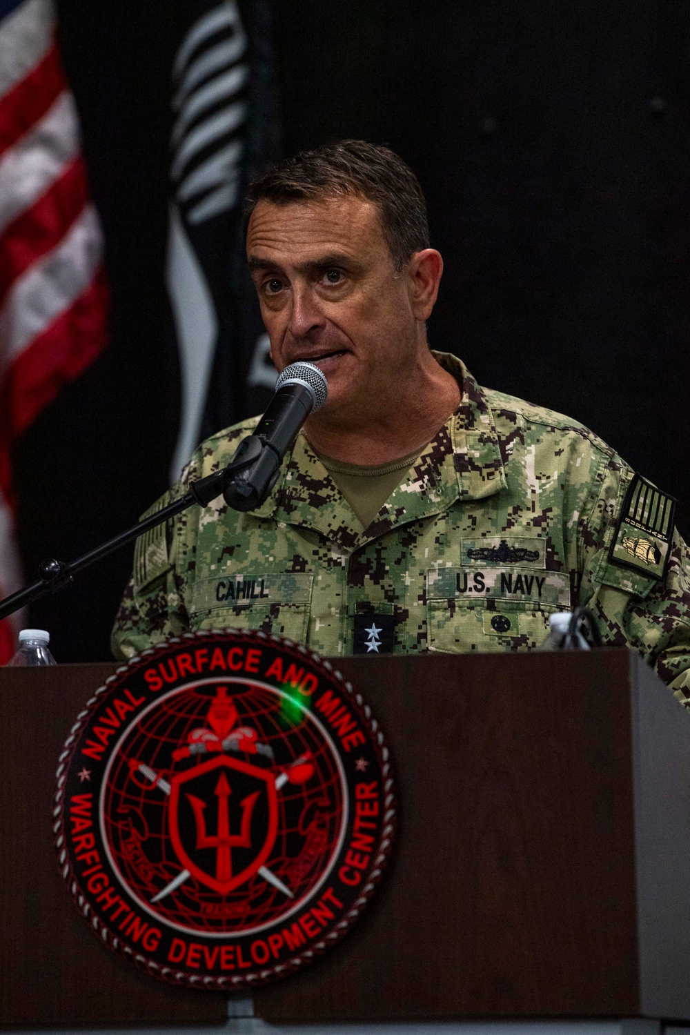 Rear Adm. Joe Cahill delivers remarks