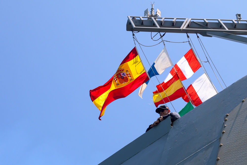 Lt. Cameron Reeves observes the foc’sle from the starboard bridge wing