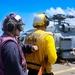 FN Edwin Flores, GSM2 Mark Bacca and BM1  Jason Carpenter man the firehose to respond to a simulated fire