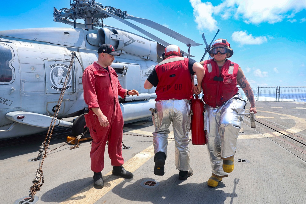 DC1 Cody Dormandy, DC3 Levi Nuslein and DC2 Asia Taylor respond to a simulated fire