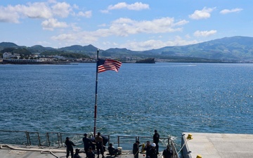 U.S. Navy Sailors pull in all mooring lines during a sea-and-anchor evolution