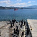 U.S. Navy Sailors pull in all mooring lines during a sea-and-anchor evolution