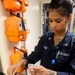 HM3 Justice Marlow tests drinking water for impurities and proper safety levels