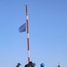 U.S. Navy Sailors raise the U.S. Union Jack flag during sea-and-anchor