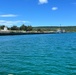 Responders assess Tinian Harbor following clean up of water oil spill