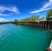 Responders assess Tinian Harbor following clean up of water oil spill