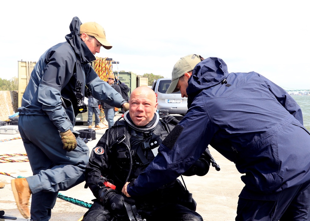 U.S. Navy Divers, Latvian Divers Remove Navigation Hazard During BALTOPS 25
