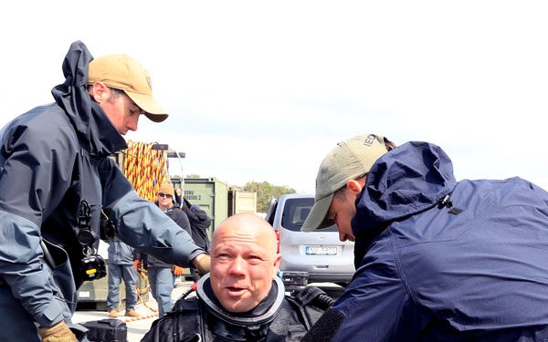 U.S. Navy Divers, Latvian Divers Remove Navigation Hazard During BALTOPS 25